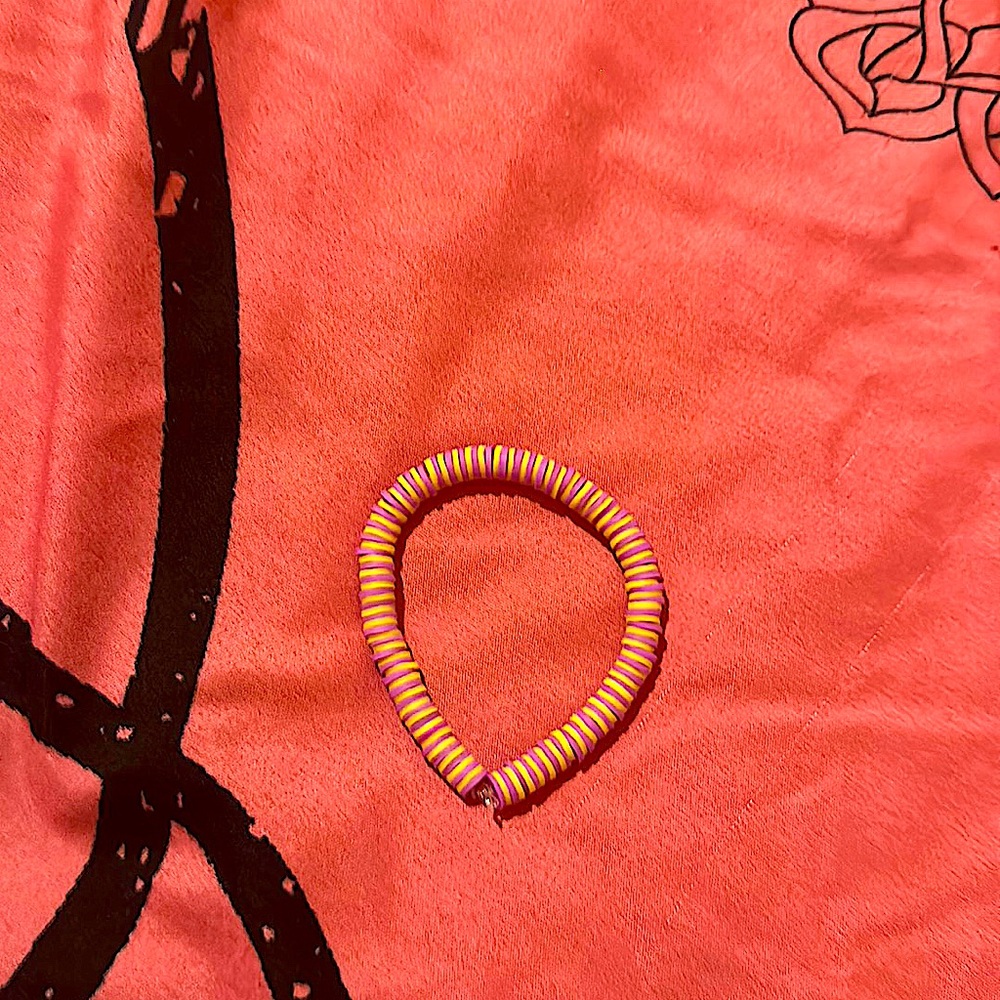 Love purple and yellow then this is the bracelet for you buy yours now.